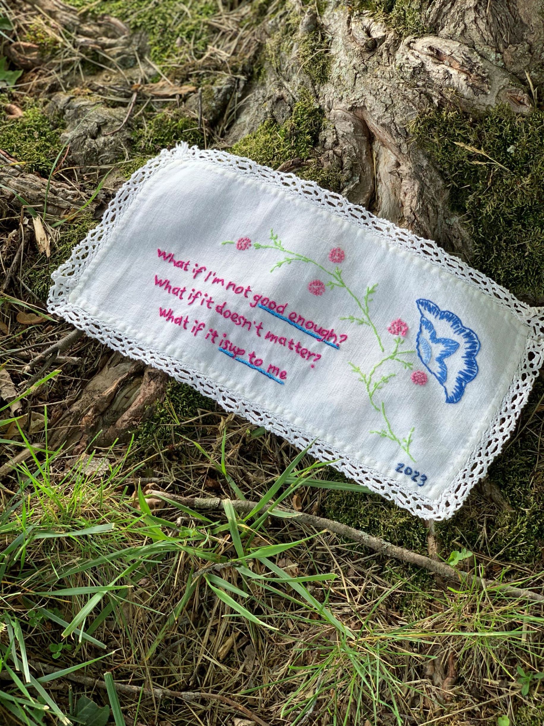 My hand embroidered text on a vintage dresser scarf (sweet floral embroidery by uknnown stitcher). 2023